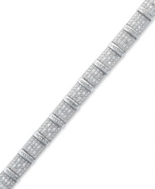 A shimmering statement. This bold sterling silver bracelet sparkles with round and baguette-cut diamonds (2 ct. t.w.) and is sure to leave a lasting impression at any formal affair. Approximate length: 7-1/4 inches.