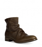 Bring urbane-cool style to your look with these luxe boots from Fiorentini & Baker - Upturned toe, supple leather with front wrinkle detail, chunky heel, exposed side zip closure - Pair with straight leg jeans or slim trousers, a sleek button down, and a blazer