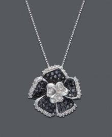 Accentuate your neckline with this bold bloom. Flower pendant features round-cut black diamond (1/3 ct. t.w.) petals with a round-cut white diamond center design and edging (1/5 ct. t.w.). Necklace crafted in sterling silver. Approximate length: 18 inches. Approximate drop: 1 inch.