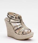 Ultra exotic, this strappy style in snake-printed metallic leather zips up the front and perches atop an espadrille platform wedge.Rope-covered wedge, 4¾ (120mm) Covered platform, 1½ (40mm) Compares to a 3¼ heel (80mm) Leather upper Front zipper Leather lining Padded insole Rubber sole Made in ItalyOUR FIT MODEL RECOMMENDS ordering true whole size; ½ sizes should order the next whole size up. 