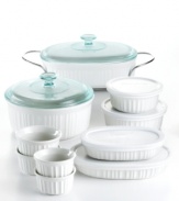 Cook in classic form! This must-have set is made of durable stoneware designed for use virtually anywhere, letting you bake, serve and store in the same dish. The classic, fluted design creates an elegant presentation for any meal, complementing cuisine to delicious perfection. 1-year warranty.