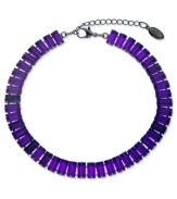 Vibrant in violet. This choker necklace from GUESS features baguette-cut amethyst crystals for a bright touch. Crafted in hematite tone mixed metal. Approximate length: 12-1/2 inches + 2-inch extender.