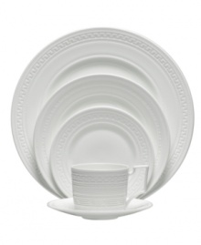 Wedgwood substitutes texture for tone in the timeless Intaglio place settings. White bone china embossed with intricate geometric patterns is undeniably modern but inspired by Georgian-era designs.