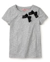 Take her t-shirts uptown with this charming Juicy Couture tee adorned with two sweet bows.