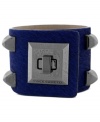 Bold and beautiful. Vince Camuto makes a statement with this bracelet featuring pyramid stud accents crafted from hematite tone mixed metal and a turnlock closure. Bracelet crafted in blue pony hair. Approximate length: 8 inches.