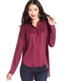 A dramatic high-low hem ups the edge on this BCBGeneration dotted blouse -- perfectly paired with skinny jeans!