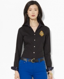 Lauren by Ralph Lauren's crisp cotton poplin shirt is accented with rich heritage details, finished with tie-striped silk at the collar and an embroidered crest at the chest.