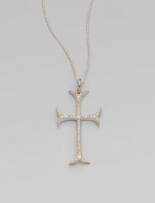 A graceful French Gothic cross sparkles with the dazzle of diamonds set in sterling silver on a woven silver chain with gold accents.Diamonds, .60 tcwSterling silver and 14k yellow goldChain length, about 18Pendant length, about 1½Spring ring claspMade in USA