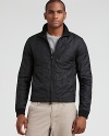 The trim, quilted nylon jacket keeps your look simple and sharp when the weather turns chilly.