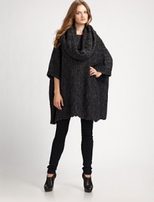 An oversized, boxy fit with a detachable neck wrap. Detachable cowlneckThree-quarter length dolman sleevesPull-on styleRibbed accentsAbout 30 from shoulder to hem48% acrylic/25% alpaca/25% wool/2% nylonDry clean