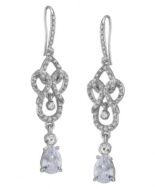 Accentuate your evening wear with elegant drops. Carolee's stunning style incorporates a scrolling setting and sparkling glass accents. Set in silver tone mixed metal. Approximate drop: 2-1/4 inches.