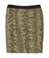 Soft silk skirt features multiple layers of glamorous python print - Flaky texture look creates dramatic style - Straight cut with narrow black waist - Short and sexy mini-length - Pair with a black blouse and ankle boots for the day and a silk tank and platform sandals in the evenings