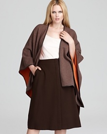 This Lafayette 148 New York look blends ease of an open cardigan with the sensibility of the trend-right cape. Luxe leather trim and a pop of color lend must-have credibility.