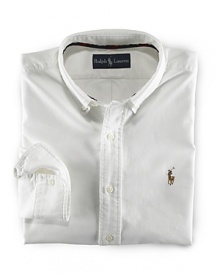 A heritage essential that never goes out of style, the oxford shirt is crafted in Polo's signature tradition, from extra soft combed cotton. This timeless design is tailored for a comfortable, classic fit. Single needle tailoring strengthens the seams and gives a clean look. Button down collar, back box pleat and split back yoke for comfortable fit.