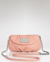 Skip the standard shades in favor of MARC BY MARC JACOBS' leather bag. In an ultra-femme hue and delicate shape, this crossbody hints at your girlie side.