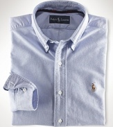 A heritage essential that never goes out of style, the oxford shirt is crafted in Polo's signature tradition, from extra soft combed cotton. This timeless design is tailored for a comfortable, classic fit. Single needle tailoring strengthens the seams and gives a clean look. Button down collar. Back box pleat and split back yoke for comfortable fit.