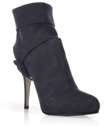 Luxurious ankle booties in fine, smoke grey suede - A wow shoe, sexy, elegant, crazy trendy - Very soft, nice quality leather - Rounded toe with delicate stiletto heel - Ankle high - A shoe that fits perfectly with all high-fashion outfits - Styling tip: for a cocktail dress, tie blouse with wide flared trousers, a business suit