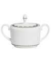 Vera Wang marries modern shapes with traditional lace in this set of dinnerware. The dishes are decidedly timeless. Platinum trim and banding add delicate feminine touches to this white bone china sugar. With double handles and an embellished lid.