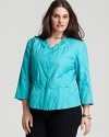 A ruffled neckline lends feminine flair to Tahari Woman's vibrant cotton jacket.