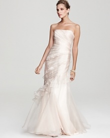 Dramatic and feminine, this Theia mermaid gown is elegantly fashioned in airy silk organza.