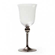 Mouth-blown by artisans in the hills outside Prague, this faceted goblet sits atop a regal hand-painted platinum stem.