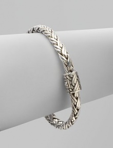 From the Classic Chain Collection. Essential Hardy, this flexible braid of sterling silver has a signature clasp.Sterling silver Length, about 7¼ Push-lock clasp Made in Bali