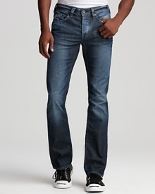 A slim cut lends urban appeal to these distressed jeans from Buffalo.