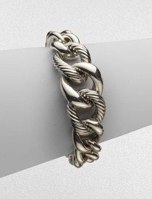 From the Chain Collection. Sterling silver in alternating smooth and twisted cable links.Sterling silver Length, about 7¼ Spring link clasp closure Imported 