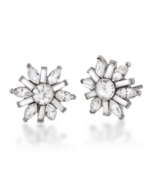 Winter wonderland. Add festive, fashionable flair to your style with Carolee's sparkling snowflake-shaped button earrings. Embellished with glittering glass accents, they're crafted in silver tone mixed metal. Approximate diameter: 1/2 inch.