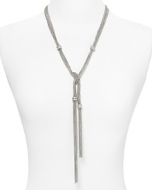 Do the twist with this layered Y-necklace from ABS by Allen Schwartz. Multiple metal chains are accented by dazzling crystal beads and knotted into one striking statement piece.