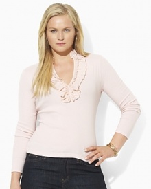 A chic ruffled V-neckline lends romantic appeal to a baby-ribbed cotton pullover.