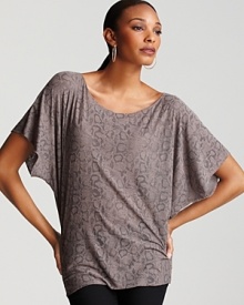 This extra-drapey Generation Love tee is emboldened by a subtle snakeskin print, offering a hint of the exotic.