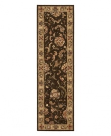 A graceful achievement in symmetry and style, this splendid area rug exemplifies the fine detail and precision handcraftsmanship of the Nourison 2000 collection. Featuring a myriad of delicate vinery and exquisite blossom medallions, this stylish piece lends warm color and perfection softness to any room in your home.