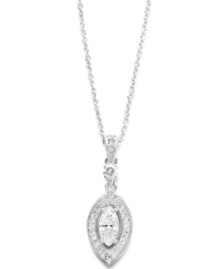 Fashionably framed. Eliot Danori's stunning framed cubic zirconia (3/4 ct. t.w.) pendant necklace will have an elegant effect each time you wear it. Set in silver tone mixed metal with sparkling crystals. Approximate length: 16 inches + 2-inch extender. Approximate drop: 1 inch.