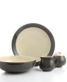 Turn your table into a work of art with black and tan Malibu serveware. Hardy stoneware in basic shapes with a unique splattered glaze hosts casual fare with one-of-a-kind style.