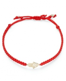 A stylish good luck symbol. This trendy wrap bracelet features a 14k gold hamsa charm strung from a red nylon rope cord. Approximate diameter: 2-1/4 inches (extends to 3-1/2 inches).