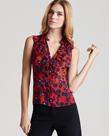 If whimsy is your weekend goal, then look to this cheery cherry print Nanette Lepore top. Ruffled at the neckline for a dose of fancy, the style lends playfulness to your staple LBPs.