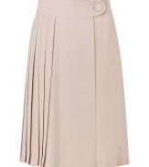 Feminine and flirty, this lovely blush-hued pleated skirt from Tara Jarmon is a chic must-have - Wide waistband with button-tab, full skirt with asymmetric pleating - Pair with a tie-neck blouse and heels