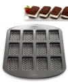 What the shouting is all about! Kick up your kitchen cred with this ice cream sandwich pan, which prepares this cool favorite with professional ease. Use the included recipe to whip up a batch of 12 mini cakes, pick your favorite ice cream center and have 6 tasty treats in no time at all-the kids are sure to come running! 10-year limited warranty.