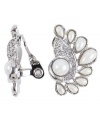 Diminutive and decorative. Good things come in small packages, and that's certainly the case with Monet's beautiful button clip on earrings. Embellished with glittering Swarovski crystals as well as glass accents and imitation pearls, they're set in silver tone mixed metal with a sterling silver post. Approximate length: 1-1/4 inches.