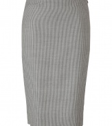 Luxurious pencil skirt in a fine cashmere-wool blend - In an elegant cream with a houndstooth pattern - Particularly nice, high quality material - Typical pencil cut, slim, figure-hugging, in a classic knee length - Wonderfully simple and straightforward, that is why it is so luxurious - No waistband, side  zip - A figure knockout, one that magically makes a dreamy silhouette - An indispensable everyday basic for business women who want to look professional, mature, feminine - Wear with an elegant blouse, tunic (evening), denim jacket (modern), blazer or long cardigan