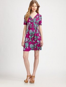 A striking print in a color palette that reflects the Lilly Pulitzer aesthetic adds a lively touch to the universally flattering wrap dress. Wrap frontShort sleevesAllover printSelf-tie beltAbout 22 from natural waist96% rayon/4% spandexHand washImported Model shown is 5'10(177cm) wearing US size Small. 