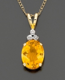 Oval-cut citrine( 2.2 ct. t.w.) crowned with diamond accents and mounted in polished 14k gold. Chain measures 18 inches.