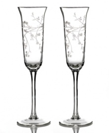 Utterly romantic, the Trousseau toasting flutes from Martha Stewart Collection feature a feminine tulip shape and etched florals in clear glass. Perfect for the happy couple.