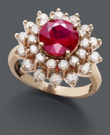 Ignite a style flame in red-hot color inspired by royalty. Effy Collection ring features a round-cut ruby (2-5/8 ct. t.w.) surrounded by a two rows of sparkling round-cut diamonds (1-1/3 ct. t.w.). Ring crafted in 14k rose gold.