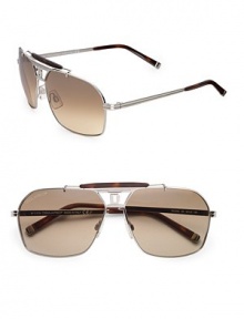 THE LOOKAviator style Metal framesLogo accented temples and end-pieces UVA and UVB protection Signature case includedTHE COLORShiny palladium with brown lensesORIGINMade in Italy