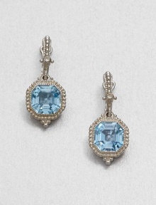 From the Estate Collection. Beautifully faceted blue topaz stones set in intricately designed, sterling silver accented with dazzling white sapphires. Blue topazWhite sapphiresSterling silverDrop, about 1.1Post backImported