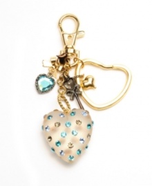 Feeling blue? Betsey Johnson's Lucite heart key chain is sure to lift your spirits! Embellished with brilliant blue crystal accents as well as bow and heart charms, it's crafted in gold tone mixed metal. Includes a gift box. Approximate length: 4 inches.