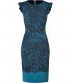 Lovely, elegant dress in fine wool blend - Features a blue-black lace print design - Feminine body-hugging silhouette with small cap sleeves with ruffles, round neck and comfortable length - Wear during the day with a blazer and flats, or to parties with heels and a clutch