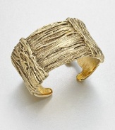 Simply stunning, this richly textured open cuff is formed of wrapped golden ropes for endless gleam and glamour.GoldplatedDiameter, about 2.7Width, about 1.6Made in France